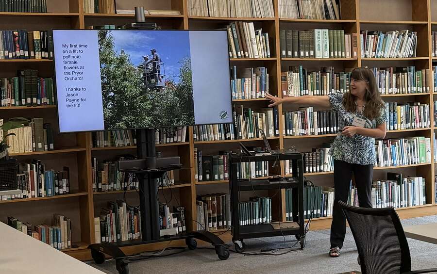 Slide shows pollination using a lift.