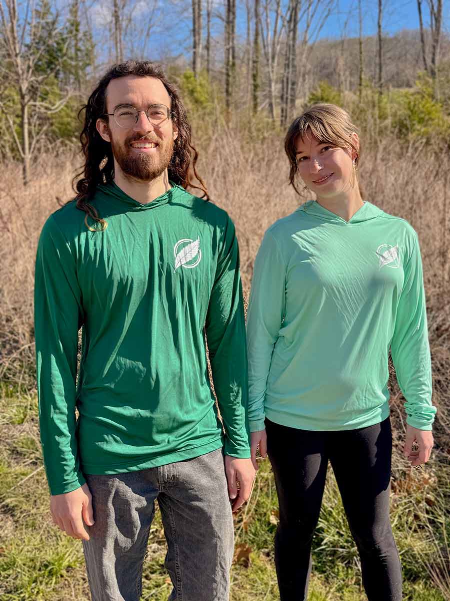 Angus and Christine wearing TACF sun hoodies