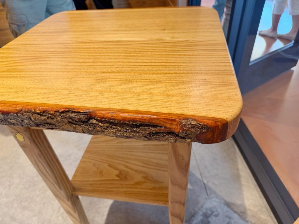 Small table crafted from American chestnut wood at the National Museum of Forest Service History.